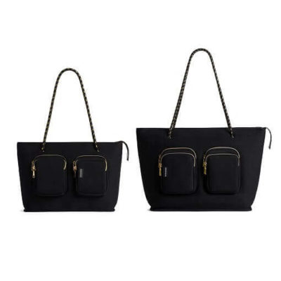 Medium black Prene Bags bec bag on left and large black Prene Bags bec bag on right