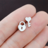 Minimal Silver Studs featuring one heart key and one heart padlock